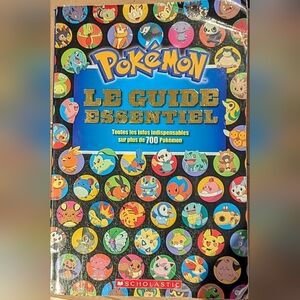 Scholastic Pokémon Le Guide Essentiel  In FRENCH